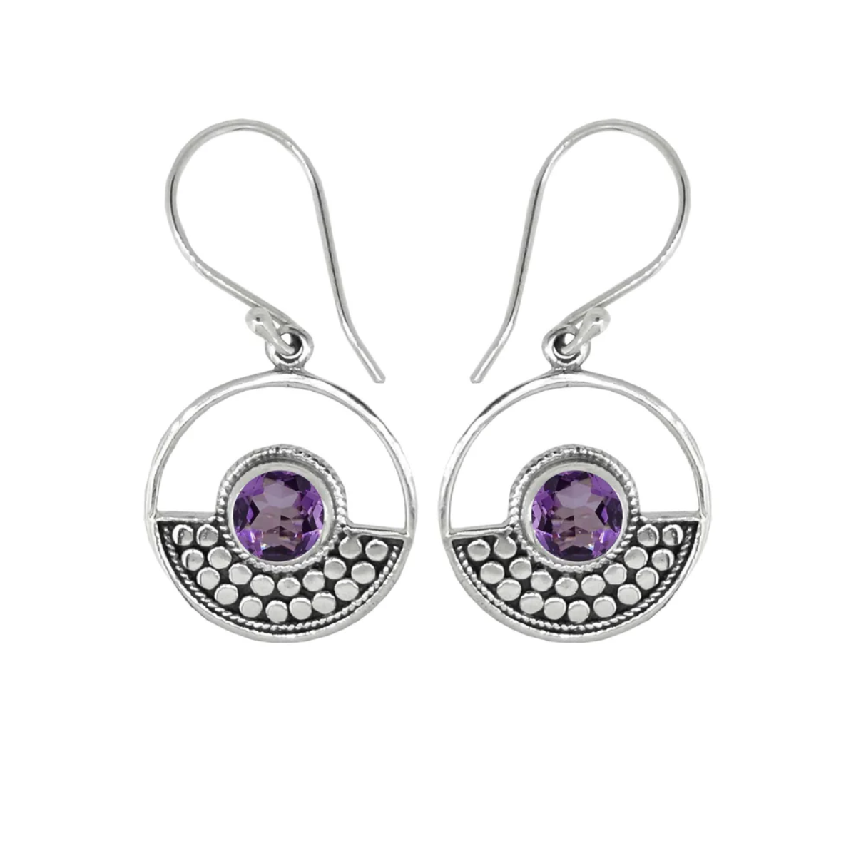Sterling Silver design in a circle surrounds a circular amethyst stone on ear wires. Half of the circle is dotted with an oxidized sterling design, the other half is open. On a plain white background.