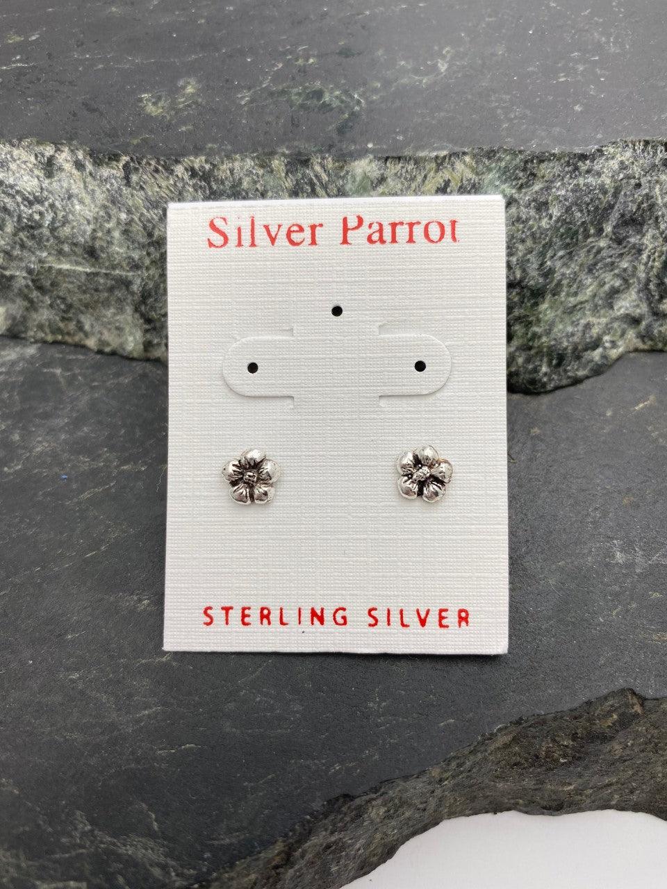 Small sterling silver stud of a pansy-like flower with 5 petals