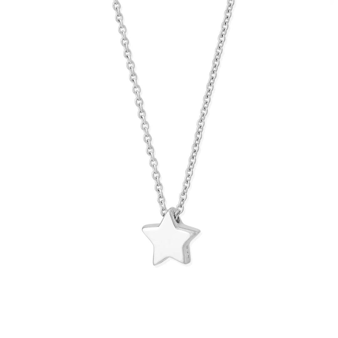 Small silver star pendant on delicate silver chain, seen on white background.