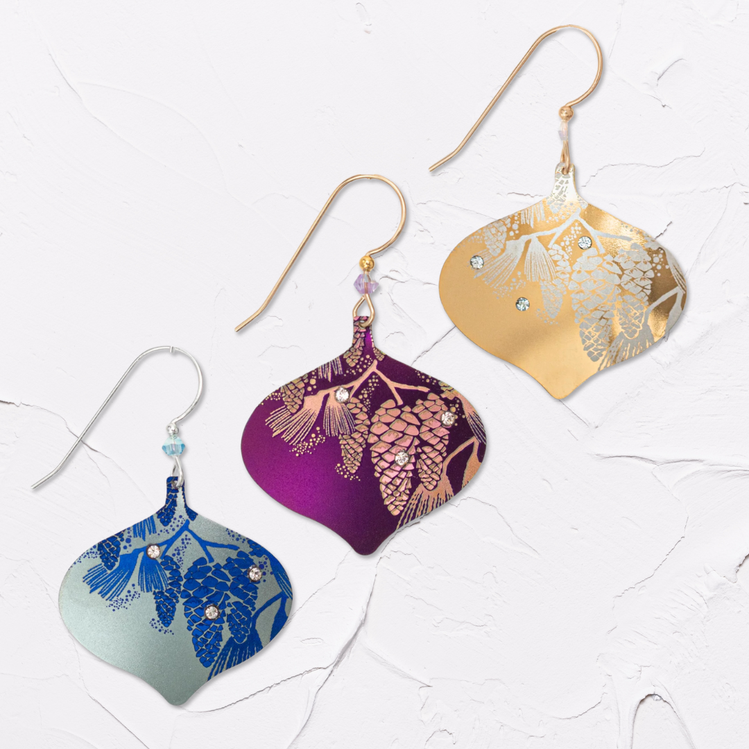 Holly Yashi Shorebreak Earrings - Navy Blue with purple gash and speckled lighter blue niobium in an overall pointed teardrop shape - purple and blue beaded silver earwires.