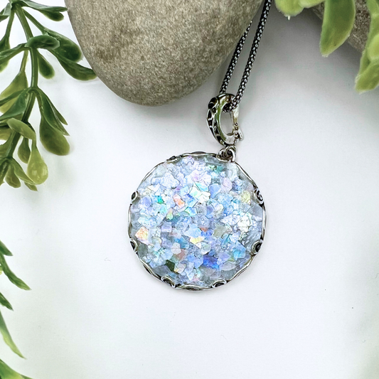 Large circular Roman Glass Necklace with an intricate clasp bail - the setting isn't too noticeable from the front but has a looped vined design. 