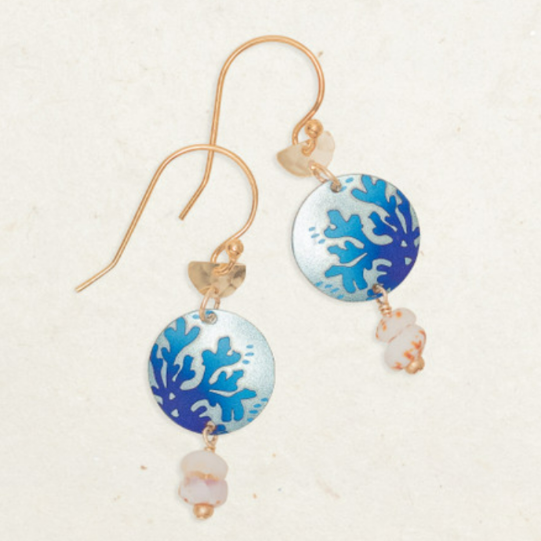 Holly Yashi Coral Reef Earrings - small golden half circle attached to round niobium with puka shell bits dangling from bottom - Silver background with navy blue coral - golden overlaid fish-hook earwires.