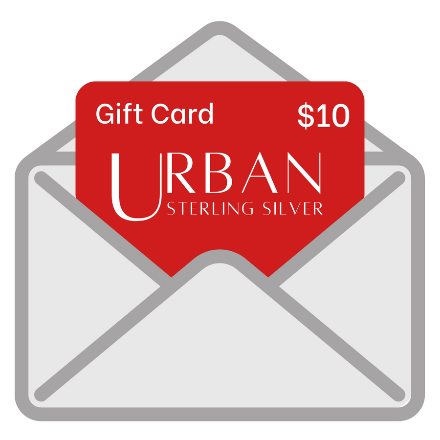 Illustration of an open gray envelope containing a red $10 gift card, displaying the text "Gift Card" and "Urban Sterling Silver Parrot" in white, with "Urban" prominently featured. In the background details, there's a subtle nod to Albany NY.