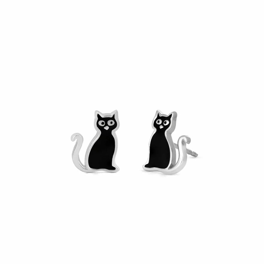 A pair of stylish sterling silver earrings shaped like black cats with white eyes. The sleek, minimalist design features the cats in a sitting posture, their tails curling gracefully. These Boma Black Cat Studs by Boma Jewelry have a playful yet elegant look, perfect for cat lovers.