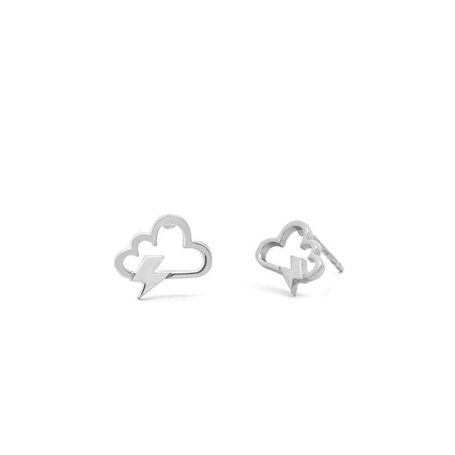 The Boma Lightning Cloud Studs are a pair of sterling silver earrings shaped like clouds with lightning bolts. One earring stands upright, while the other leans slightly to the side. Their simple, minimalist design features a polished finish, making them perfect for anyone who loves nature-inspired jewelry.