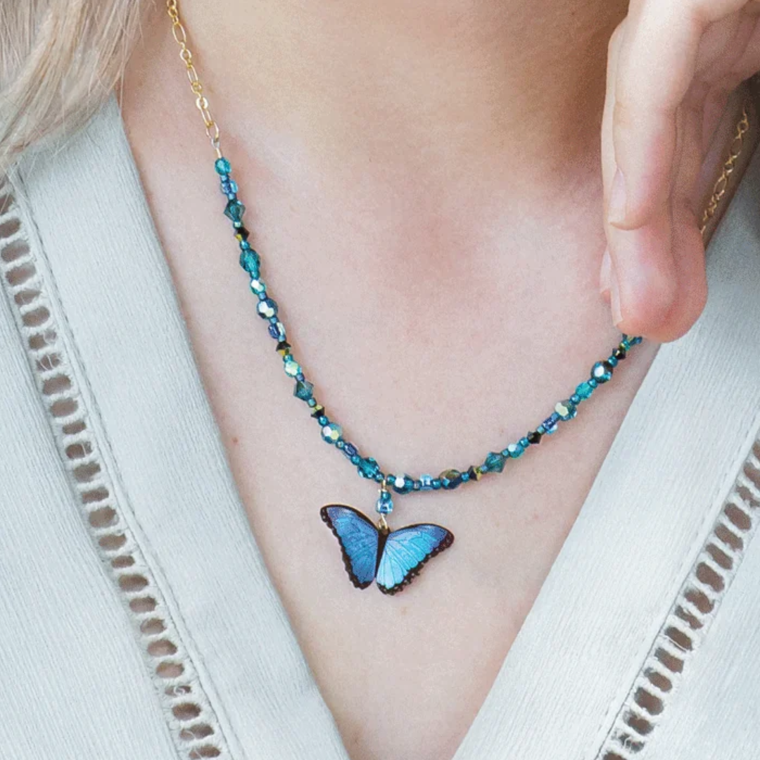 Holly Yashi Bella Butterfly Beaded Necklace - Color Blue Radiance - 18k gold-plated and niobium butterfly pendant - shown on model