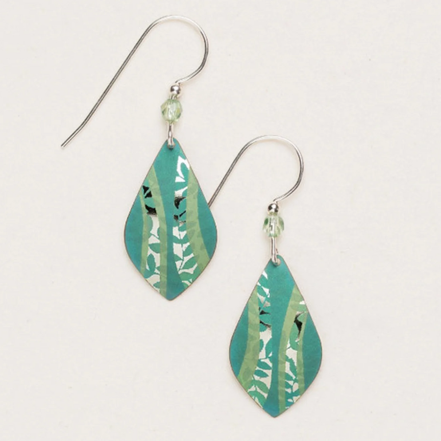 Introducing the Holly Yashi Riverwind Earrings: a pair of elegant dangly, leaf-shaped beauties crafted from teal, white, and green materials. Each earring features a silver hook adorned with a small crystal bead that connects to the botanical charm of the marbled leaf design.