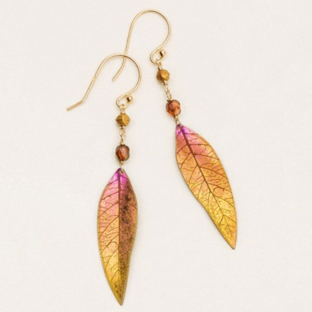 Holly Yashi Shimmering Willow - Lightweight red-to-gold color gradient leaf dangle earring with venations etched into the metal work. At the top of the leaf are two gold and red-colored beads respectively, separated by a gold chain on a gold-filled ear wire.