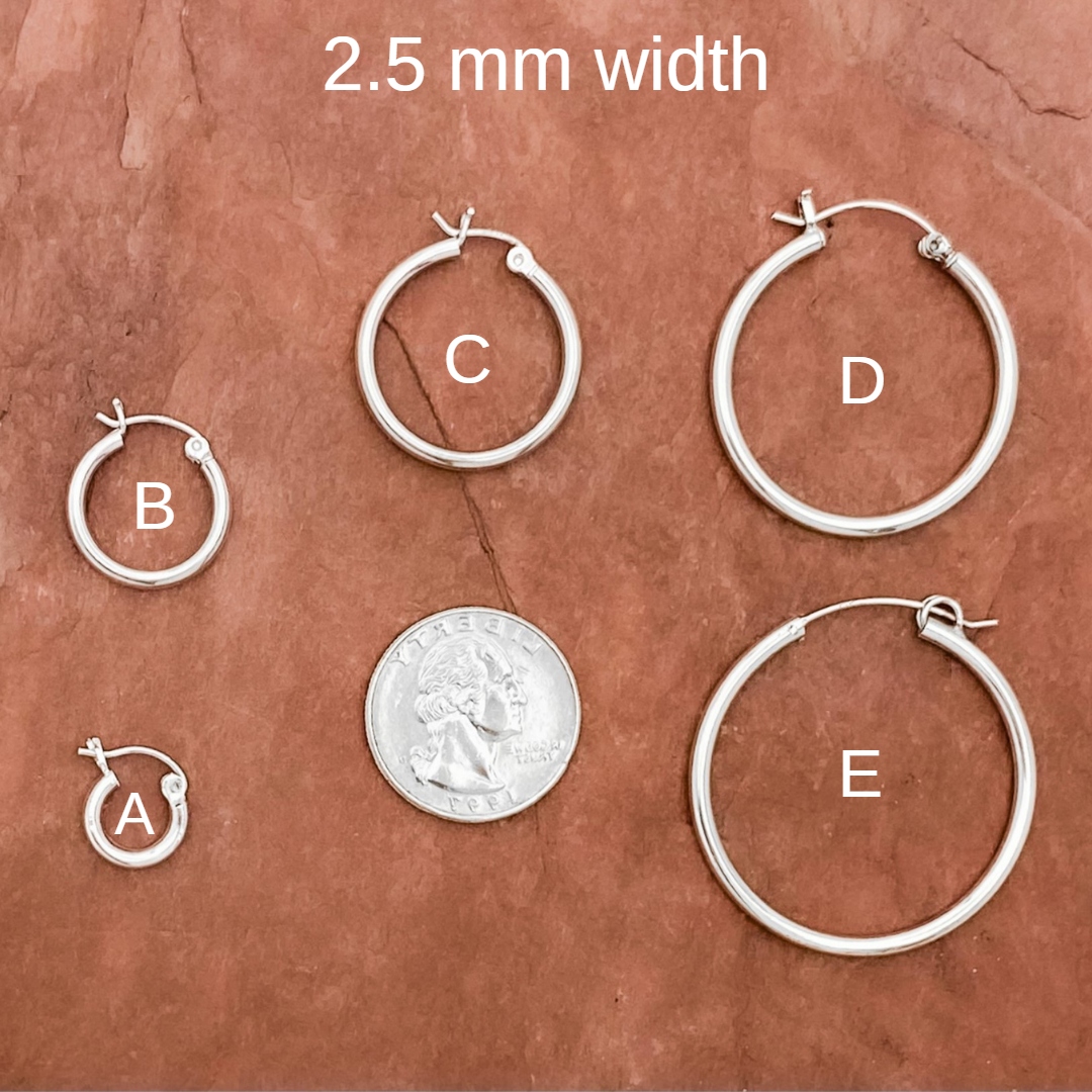 Four sizes of 925 Sterling Silver 2.5mm clip clasp hoops compared to a quarter