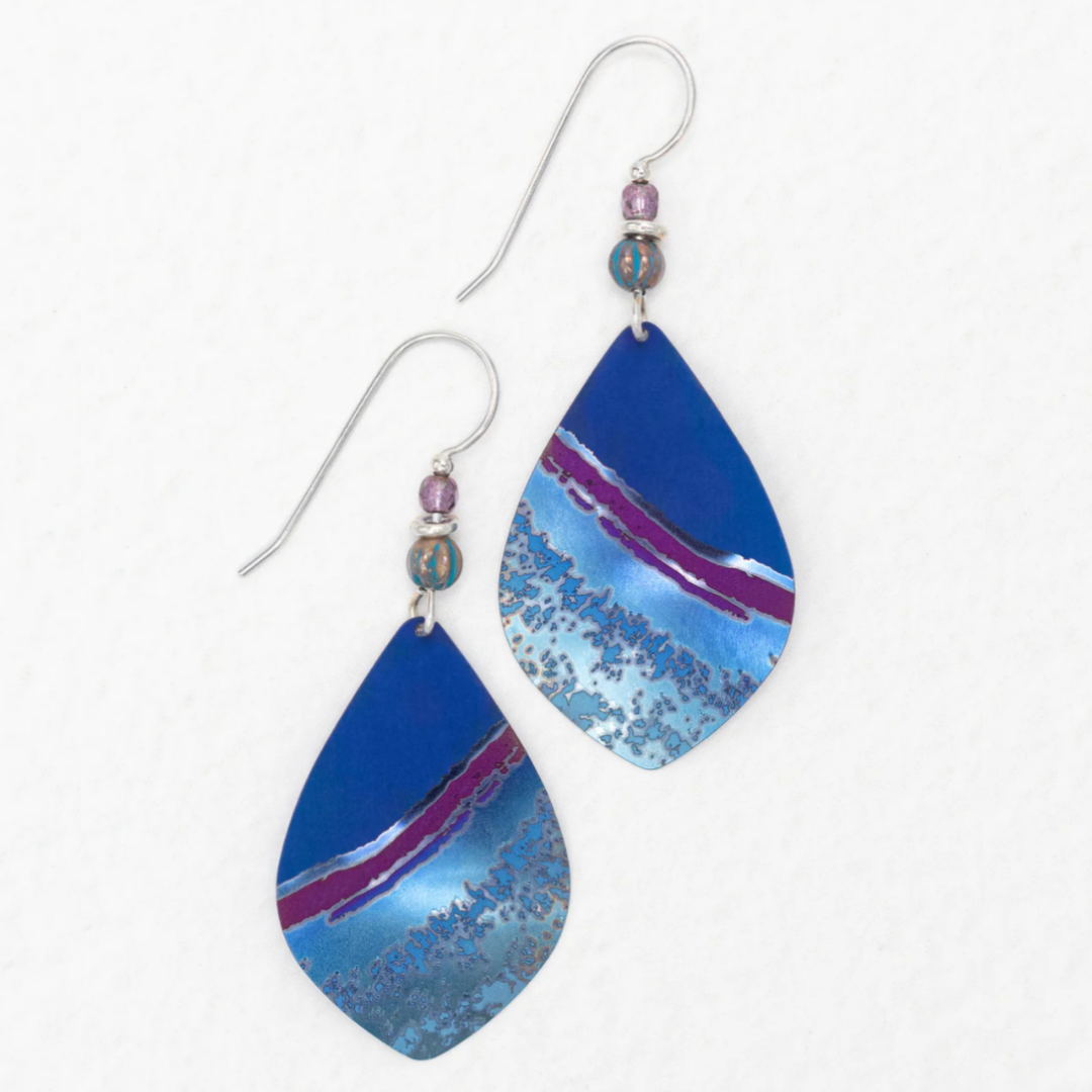 Holly Yashi Shorebreak Earrings - Blue Depths - Navy Blue with purple gash and speckled lighter blue niobium in an overall pointed teardrop shape - purple and blue beaded silver earwires.
