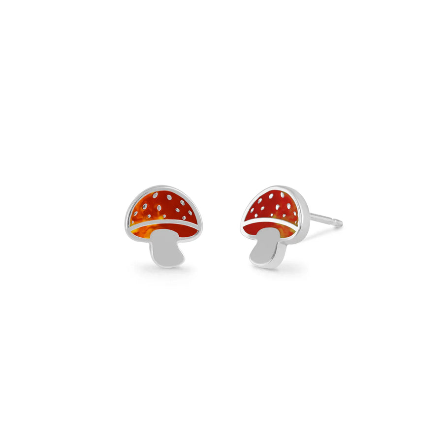 The Boma Mushroom Studs are a pair of whimsical, mushroom-shaped stud earrings with sterling silver outlines and vibrant red caps adorned with white spots. These hypoallergenic earrings boast a simple yet playful design and are showcased against a plain white background. Complement your style with the matching necklace for a complete, enchanting look.