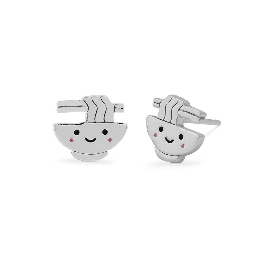 The Boma Happy Ramen Studs are a pair of sterling silver earrings designed to resemble smiling bowls of noodles. These charming studs feature a simple, cute facial expression with black eyes and blushing pink cheeks, adding a touch of quirky jewelry charm to any outfit.