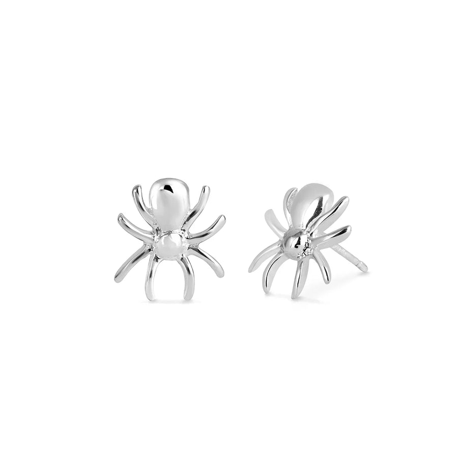 The Boma Spider Studs are a pair of shiny earrings shaped like small spiders. Each earring, crafted from hypoallergenic sterling silver, features eight legs and a round body. The design is minimalistic and polished, offering a sleek and modern look against a plain white background.