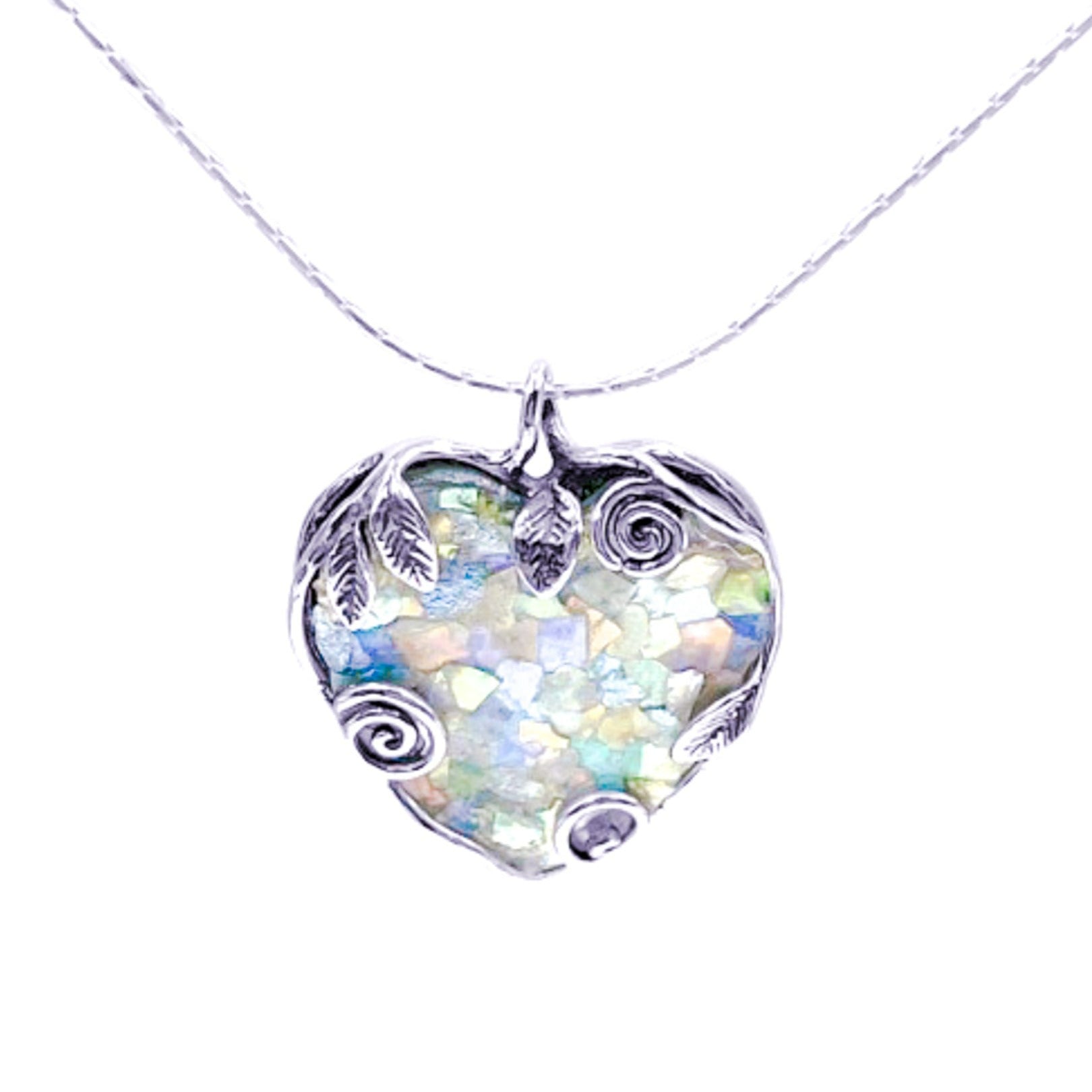 Heart shaped Roman Glass set in 925 Sterling Silver with vines and leaves detailing - the spirals and leaves are holding the stone down