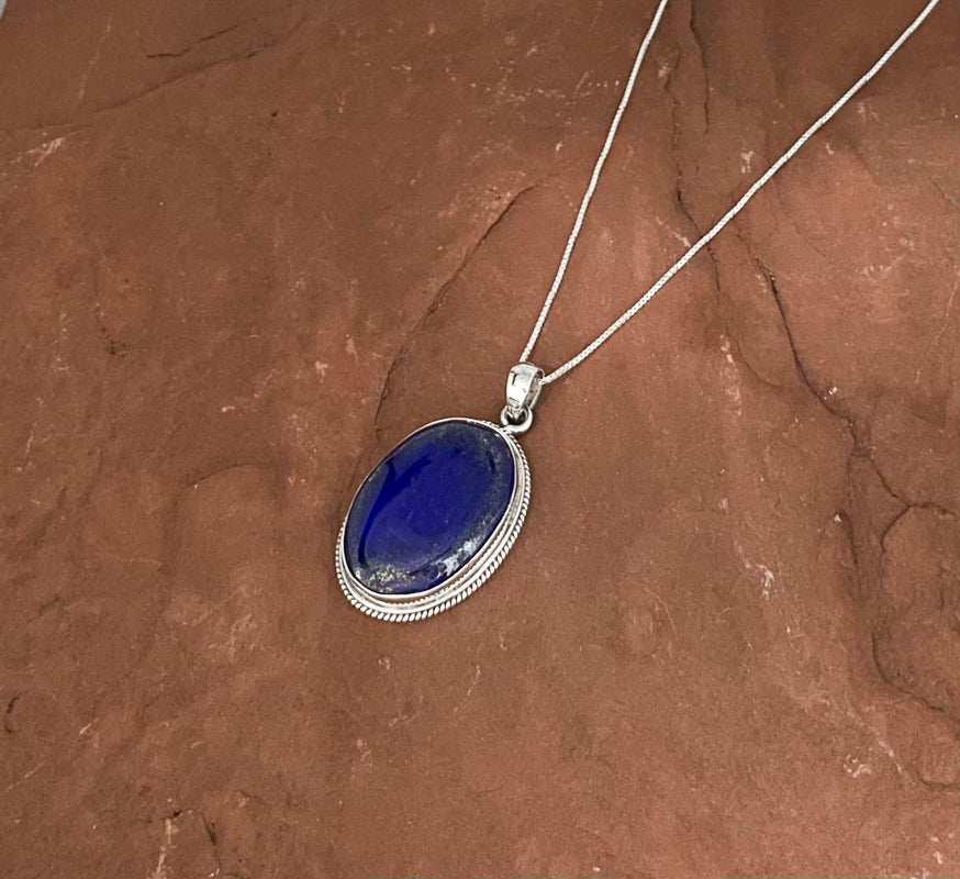 Unique Lapis Pendant In Sterling Silver.