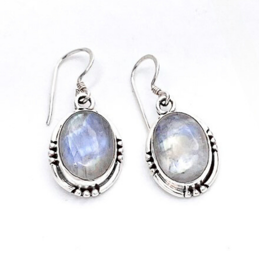 Medium sized oval shaped blue moonstone set in a simple 925 sterling silver setting with matching sterling earwires