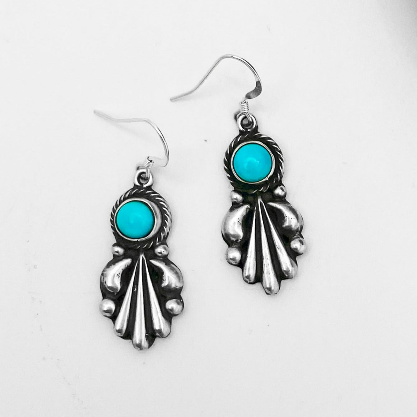 Small circular Navajo Turquoise set in cascading 925 Sterling Silver fan design - old pawn style with braided frame around the stone - Southwestern Traditonal - Clearly Hallmarked - Annie Springer from New Mexico