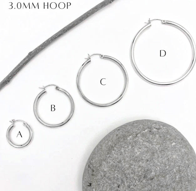 Slightly thicker but classic sterling silver hoops. 4 sizes available