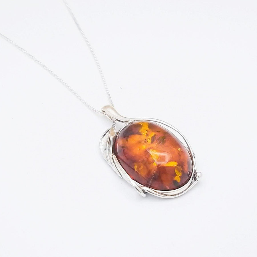 Urban Sterling Silver - Oval shaped Baltic Amber in floral / vine-like 925 sterling silver setting on 18" simple box chain