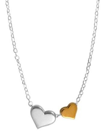 necklace with one small gold heart and a larger silver heart to its left