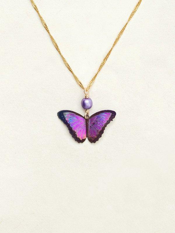 Bright Purple butterfly pendant with black outline on a gold chain with a shiny purple bead.