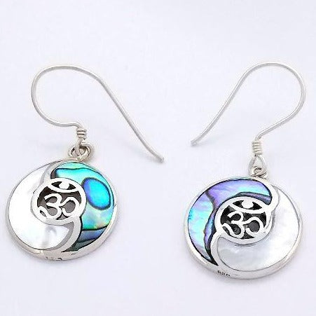 silver yin yang earring with mother of pearl and abalone. ohm in center