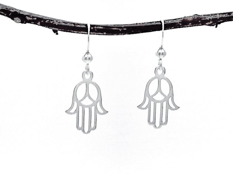 silver hamsa hand outline dangle earrings with pinky and thumb extending outward and two curved wires in the center to make an almost peace sign