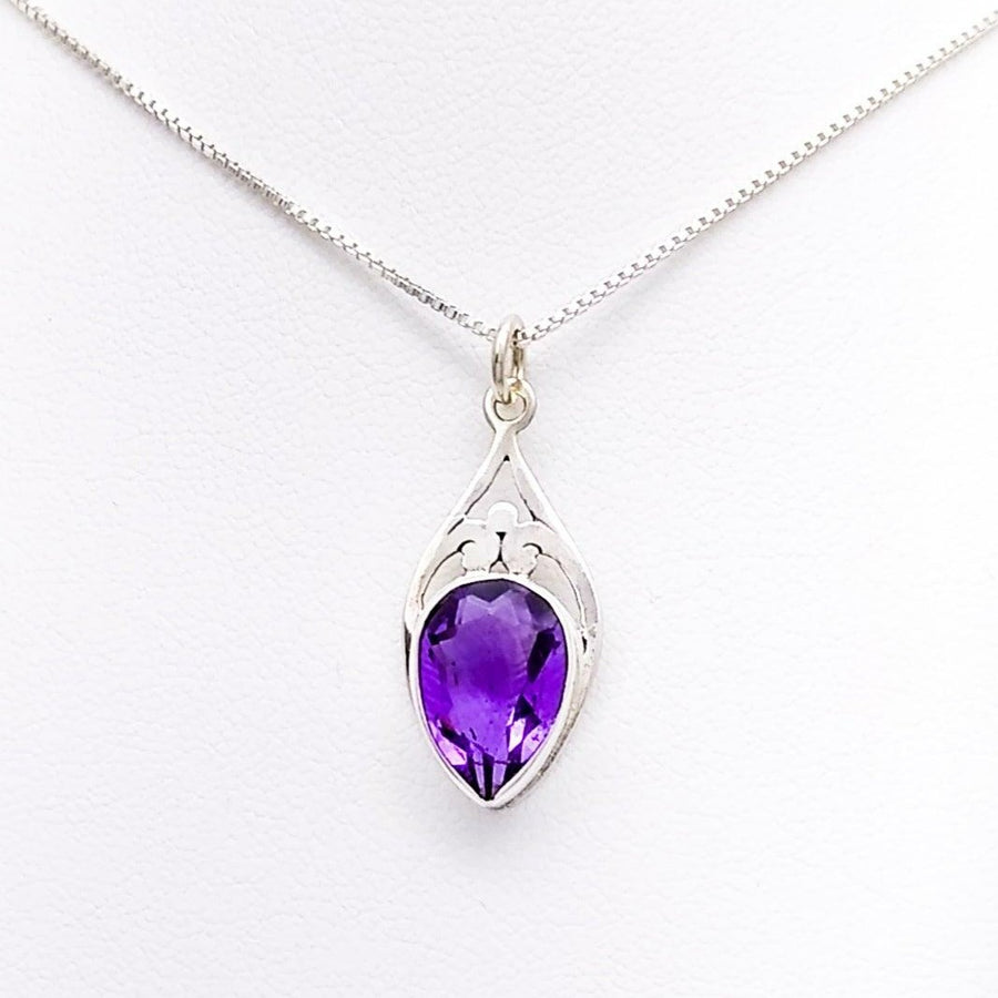 Sterling diamond-shaped pendant with a faceted amethyst in an upside-down teardrop shape. 