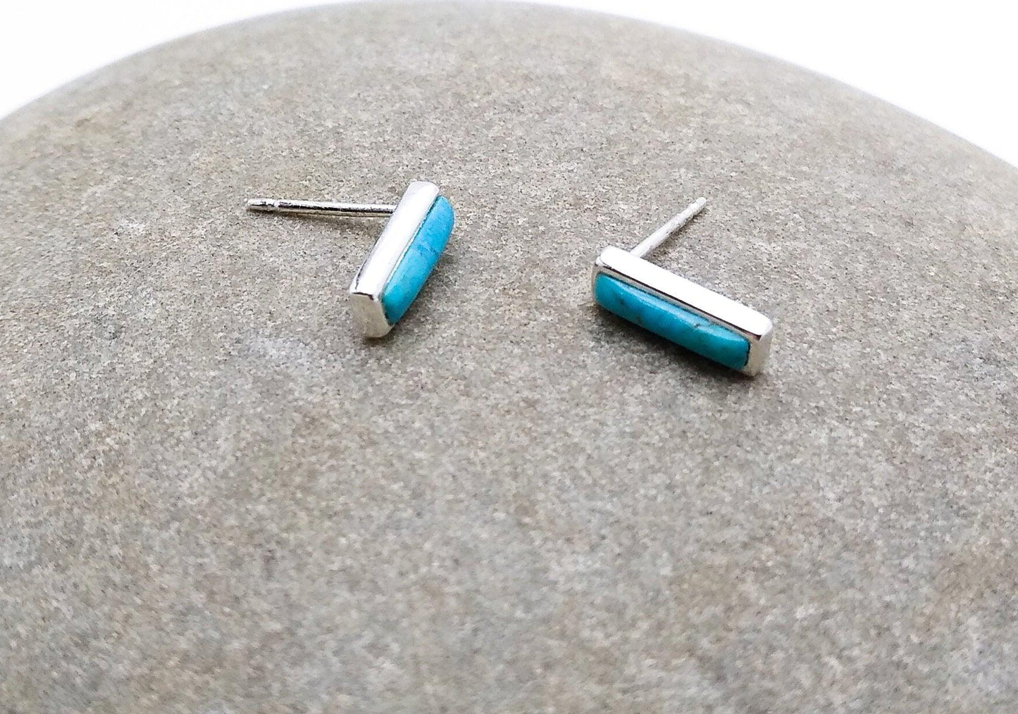 Boma sterling silver bar studs with inlaid blue Turquoise on a simple sterling setting.