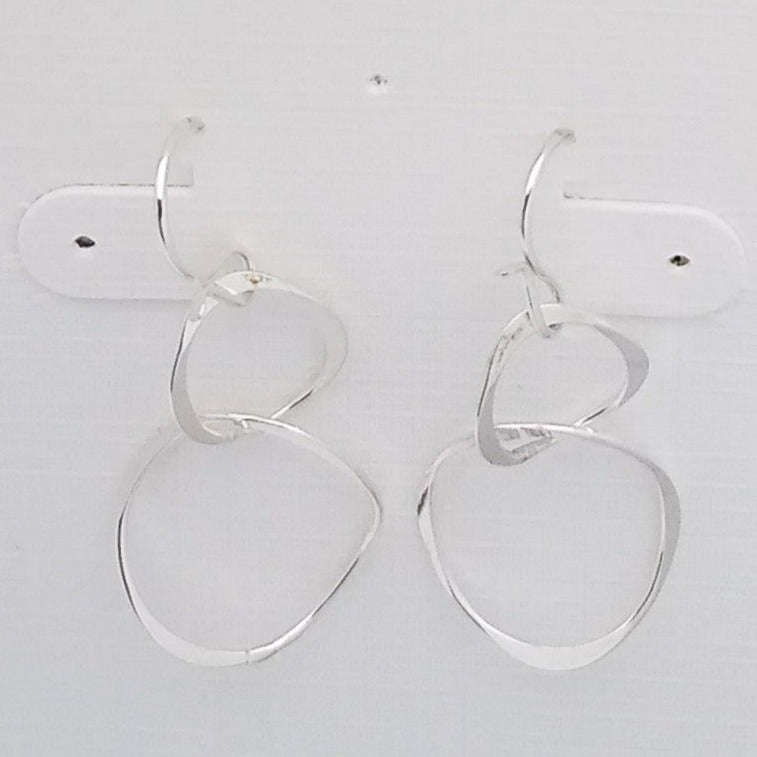 Sterling Silver Intertwined Hoops - Silver Parrot, Inc. 
