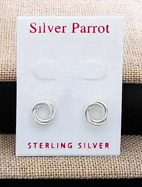Sterling silver hooped studs entwined into a wire knot pattern.