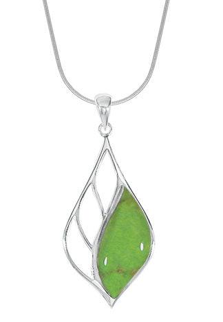 Boma leaf shape pendant with cutouts on left half and a green turquoise set in the right side with a bale at the top. Comes with 18-inch sterling snake chain. Turquoise is the December birthstone.