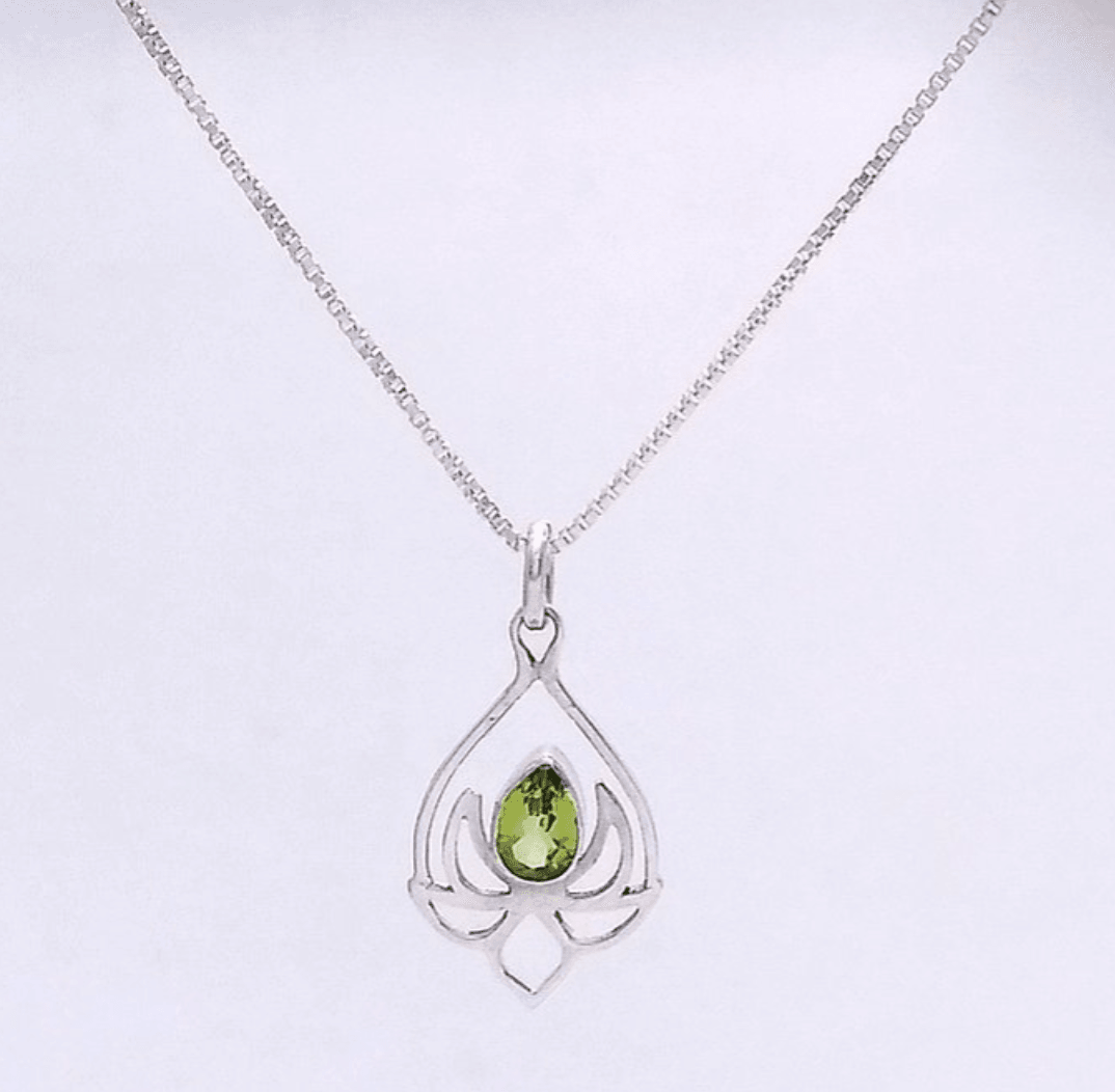 Sterling silver lotus pendant with a small peridot stone in the middle. Comes on an 18-inch box chain. Peridot is the birthstone for August.