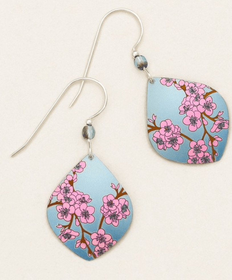 Diamond-shaped niobium earrings with pink cherry blossoms on a pale blue background. Sterling silver ear wire has a small bead at the bottom.