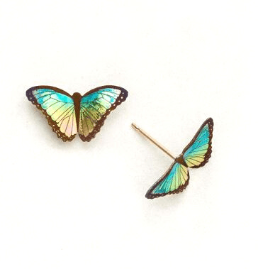 vibrant green to yellow gradient realistic butterfly on a gold post
