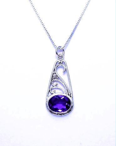 silver pendant with amethyst and filigree
