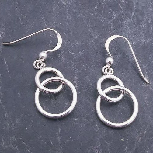 925 Sterling Silver dangles with two intertwined different sized circles on a ball earwire