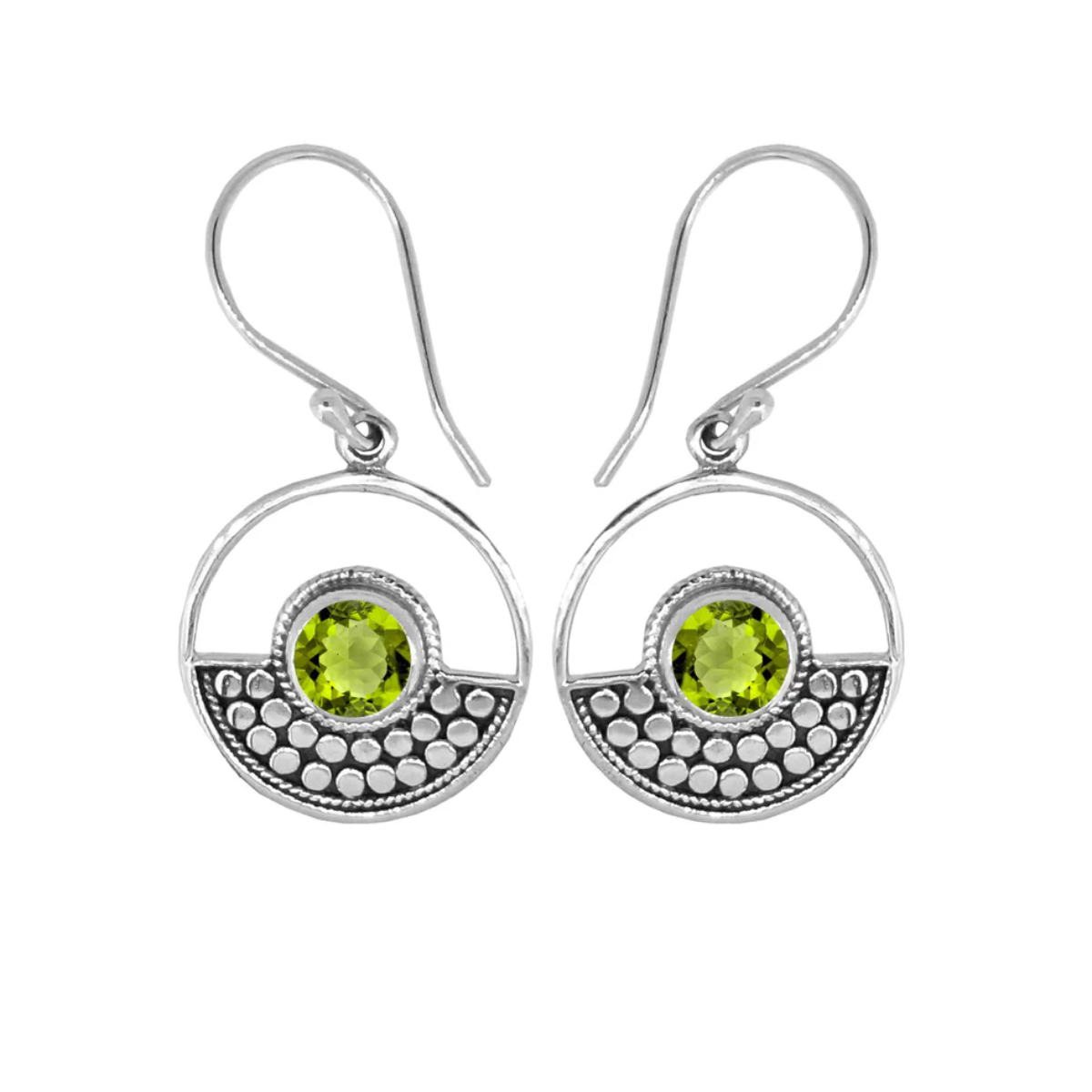 Sterling Silver design in a circle surrounds a circular peridot stone on ear wires. Half of the circle is dotted with an oxidized sterling design, the other half is open.  On a plain white background. 