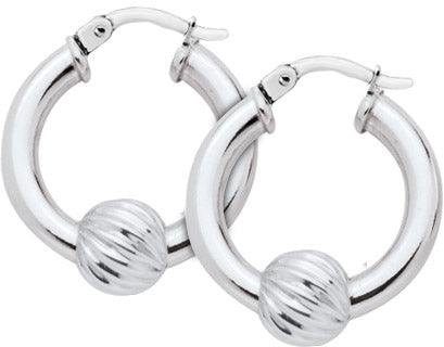 Sterling silver Cape Cod hoop earrings. Hoops are plain silver with a small swirl-patterned silver bead at the middle.