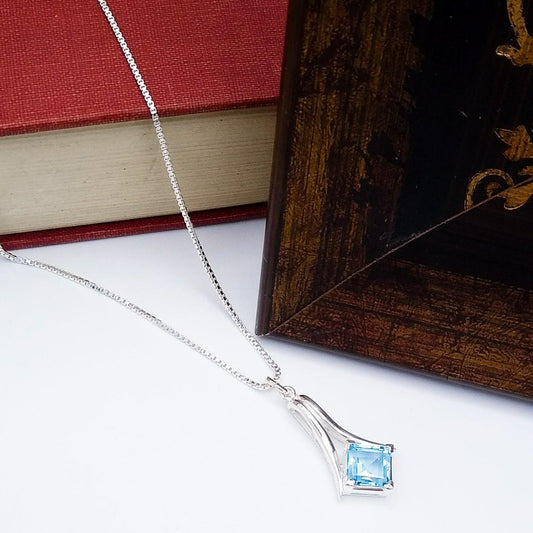 Sterling Silver Pendant With Blue Topaz - Silver Parrot, Inc. 