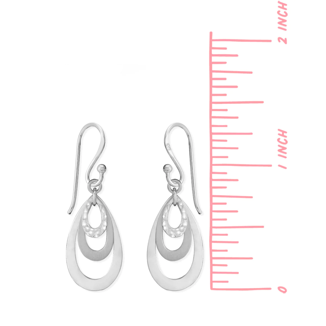 Sterling silver dangle earrings. 3 teardrop hoops. 1 hammered, 1 matte finish, 1 high polish. Just over 1.25" in length.